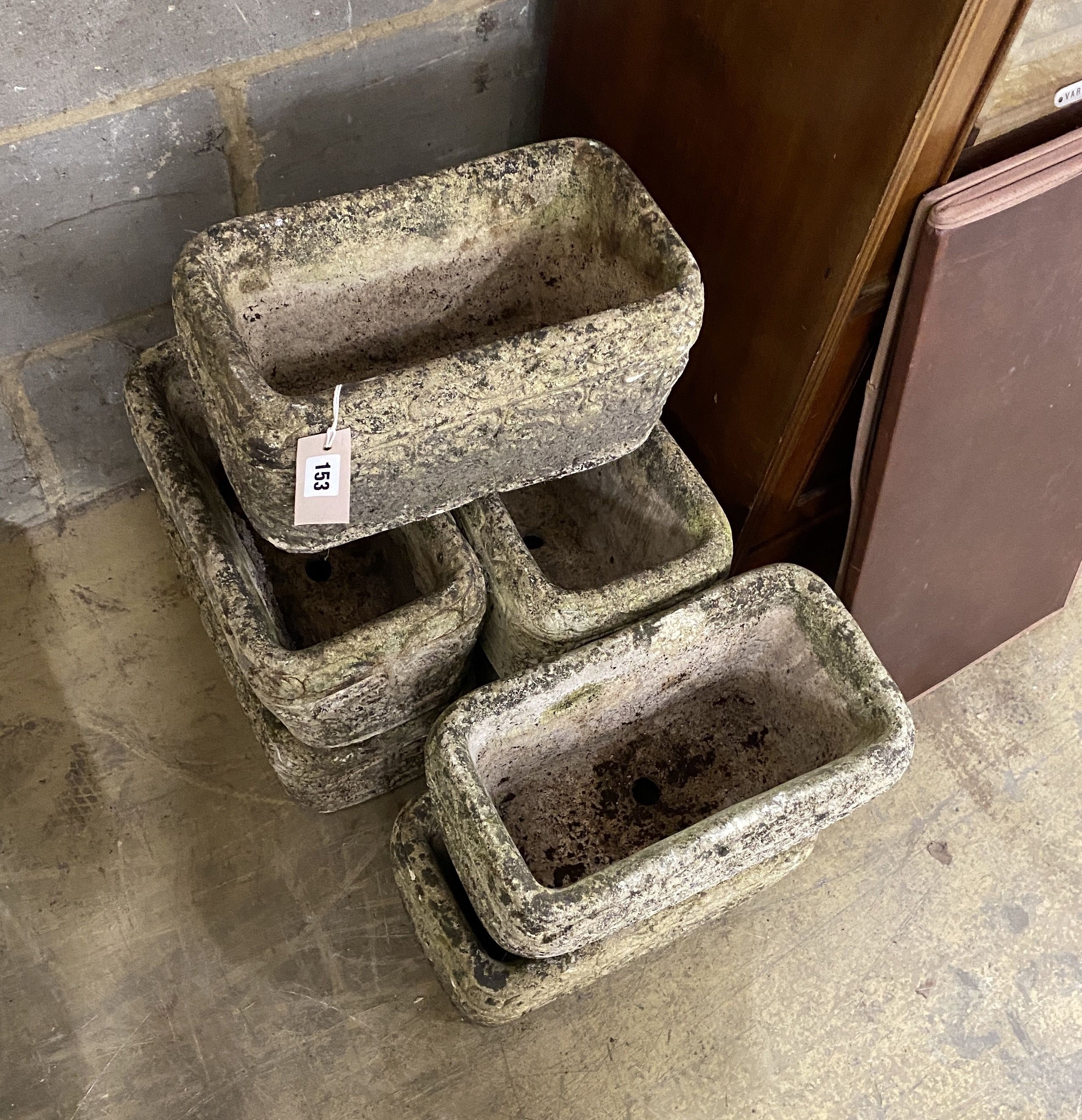 Seven rectangular reconstituted stone garden planters, width 34cm, depth 18cm, height 18cm